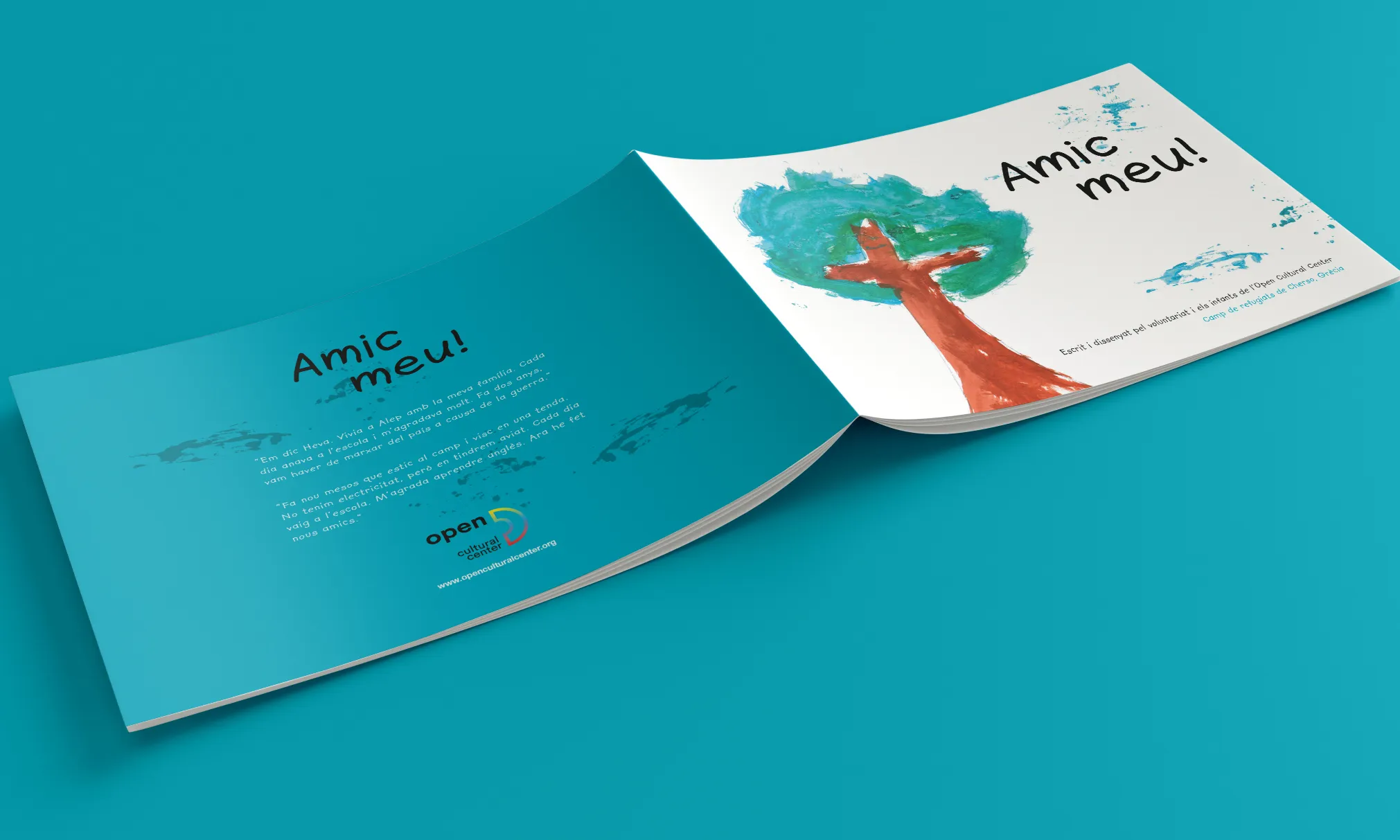 Llibre 'Amic meu!' obert deixant veure la portada amb una il·lustració d'un arbre feta per un infant i la contraportada.