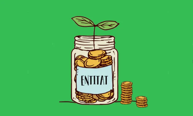 Una planta brota en un pot amb monedes