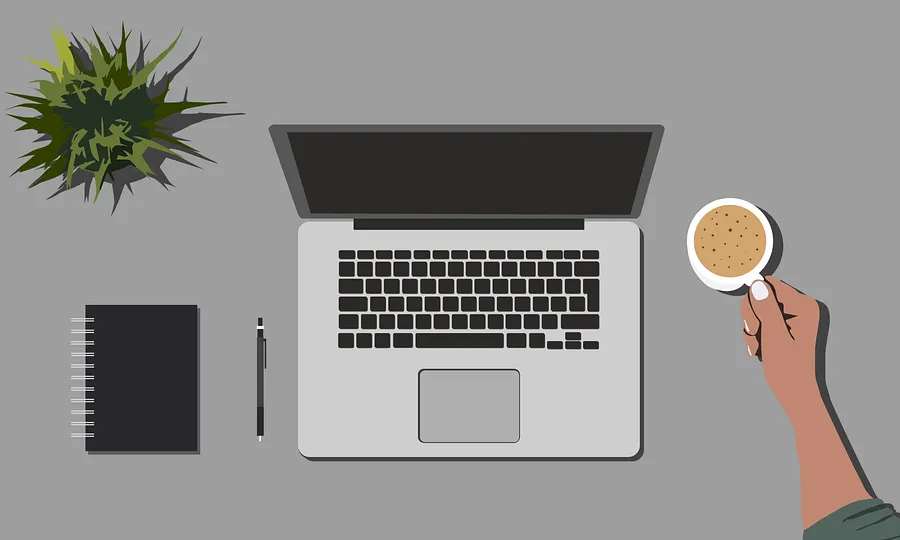 Il·lustració d'una persona teletreballant amb un cafè i un ordinador portàtil.