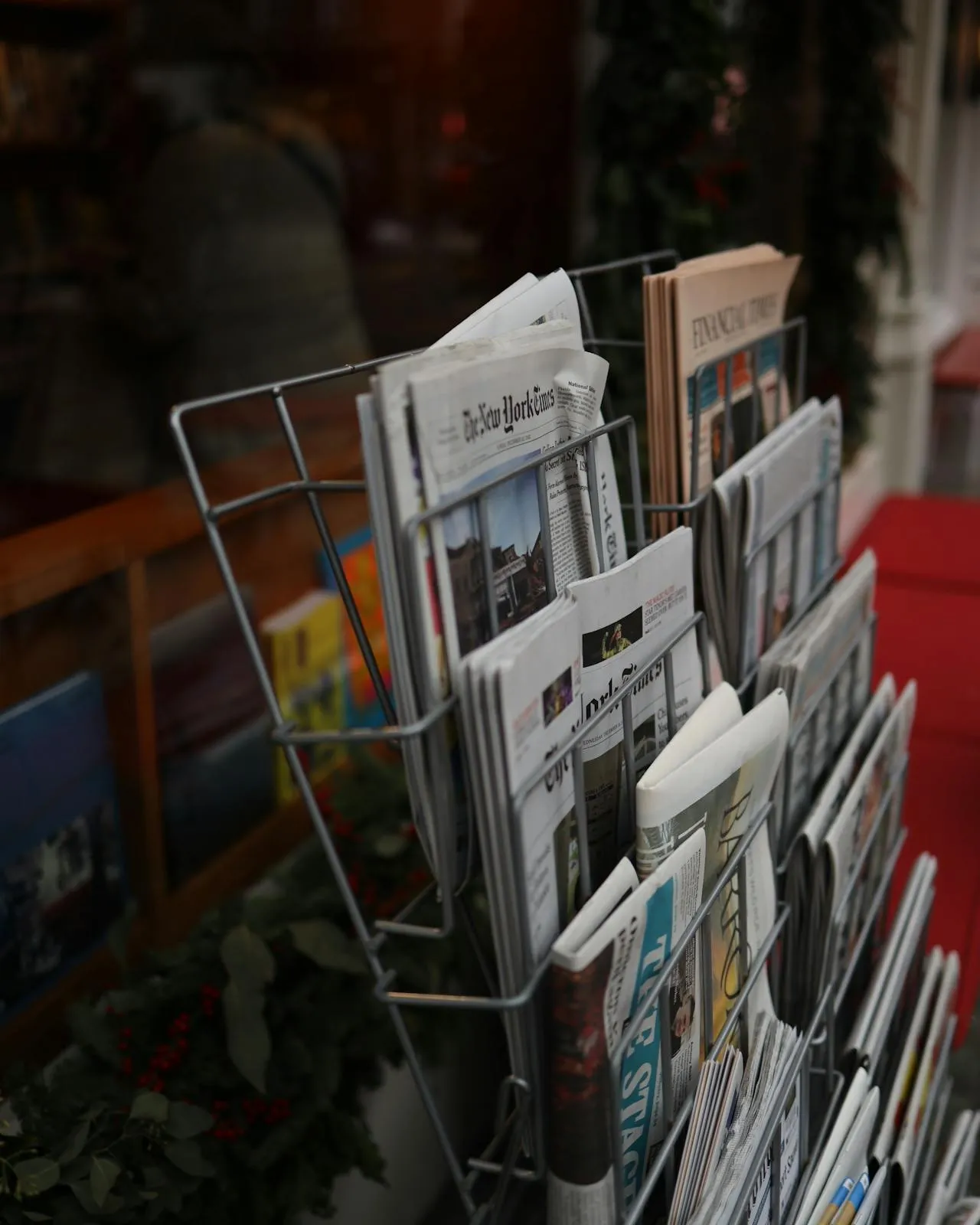 Diaris i revistes en un quiosc Diaris i revistes en un quiosc