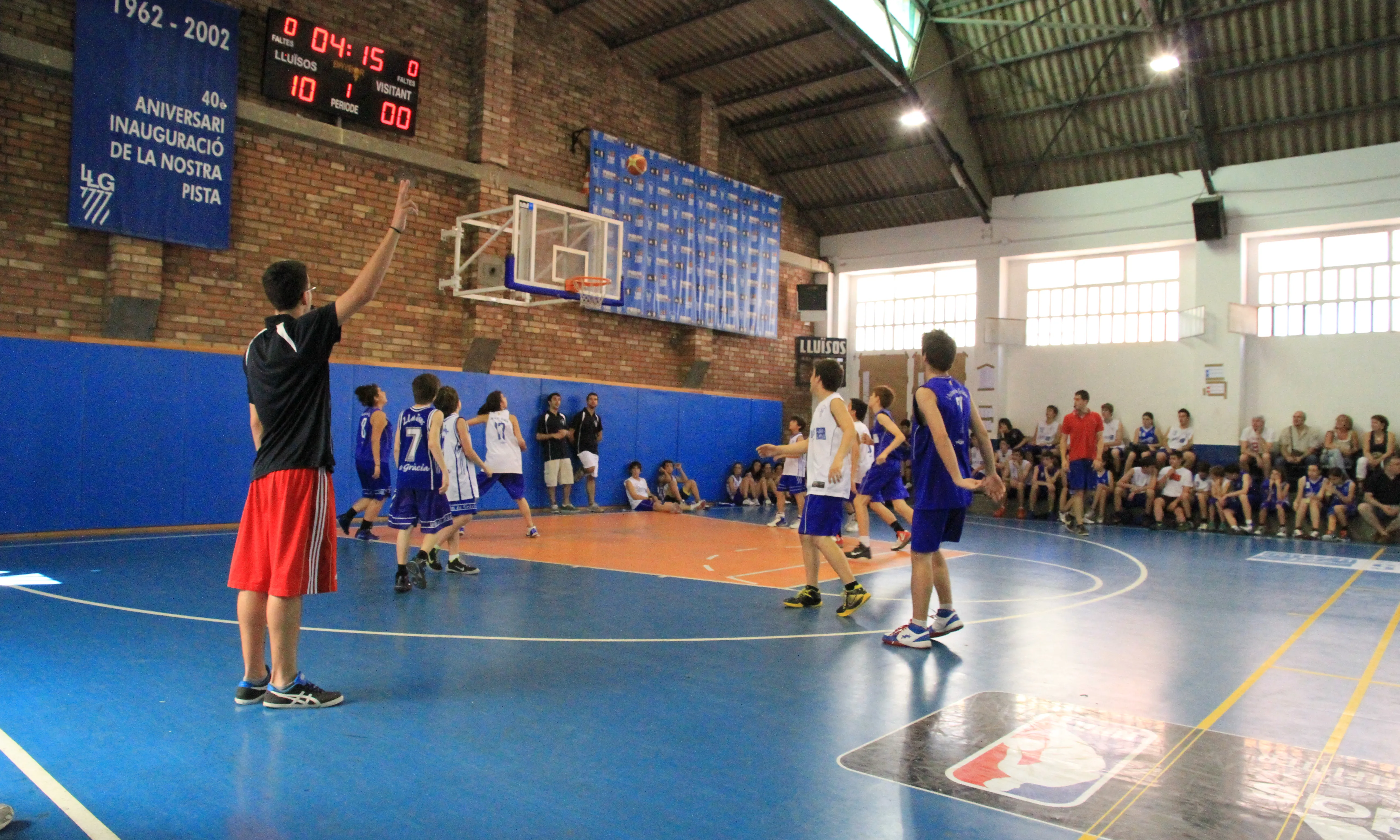 Partit de bàsquet a Lluïsos de Gràcia