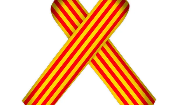 El llaç amb la senyera és el símbol de la campanya "Enllaçats per la llengua".