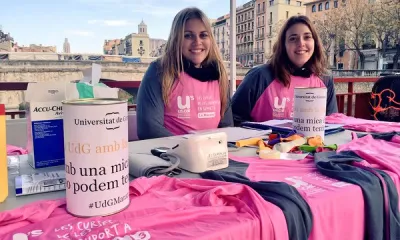 Voluntàries de la UdG en un estand de captació de fons (Font. UdG)