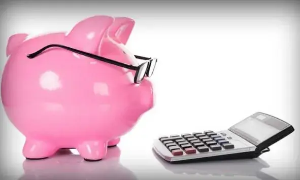 Guardiola amb calculadora. Font:www.grupsimon.com